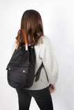 Baker black waterproof duffel backpack