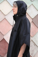rain cycling cape poncho waterproof bike london urban oilcloth wax waxed cotton reflective be seen cycling lights rainproof oilcloth